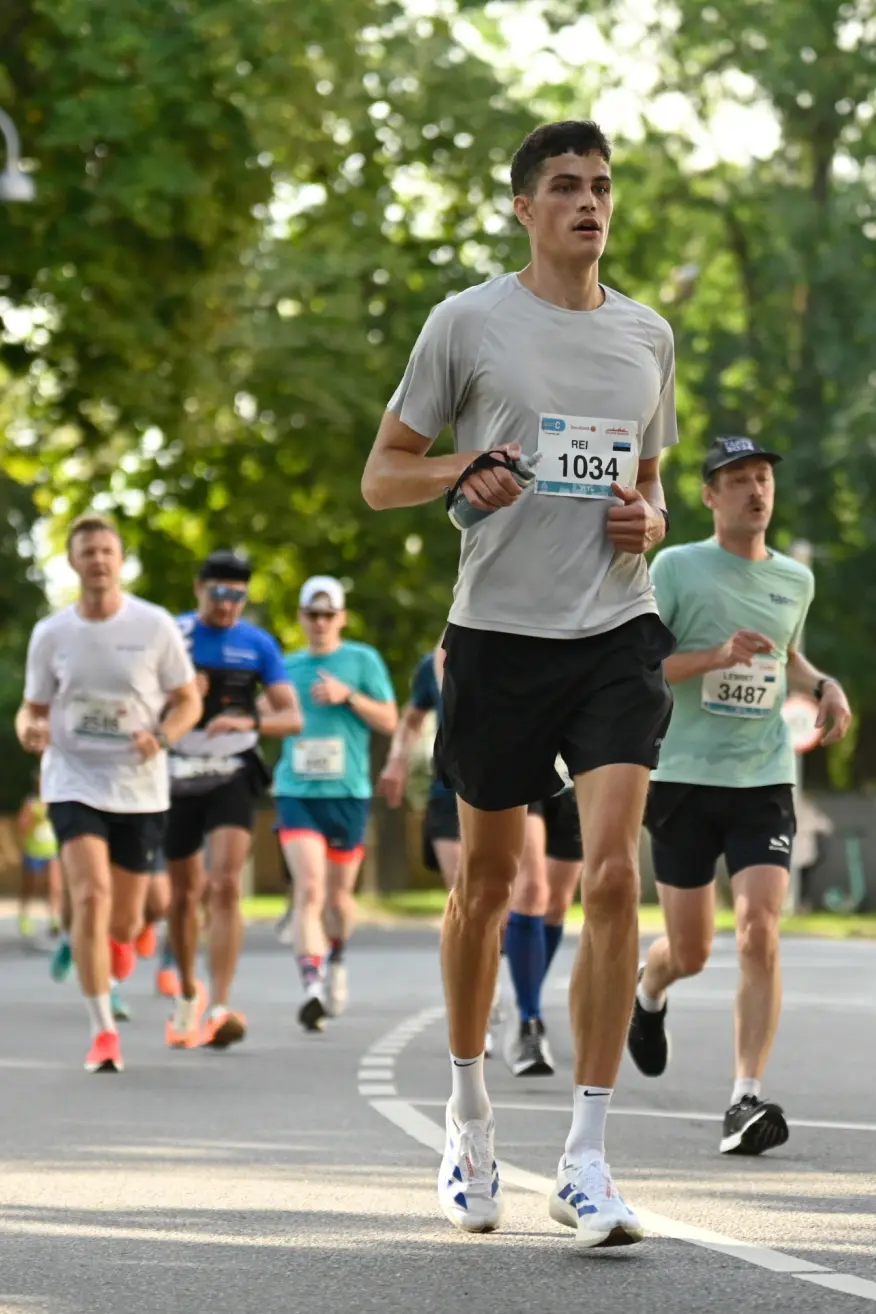 Runners in a scenic outdoor setting
